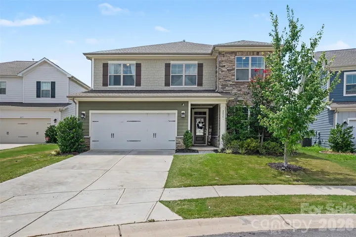 On a sidewalk-lined cul-de-sac, this home is a true gem...