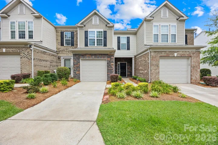Ideally situated in the gated community of Park South Station, this beautifully maintained townhome offers exceptional curb appeal in one of South Charlotte's most desirable locations.