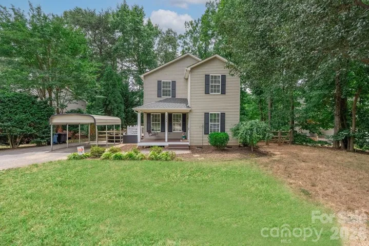Charming 2 story home nested in mature trees