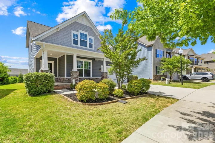 Welcome to 3022 Oakmere Road in award-winning Millbridge! Featuring charming curb appeal with a rocking chair front porch and a two car garage.