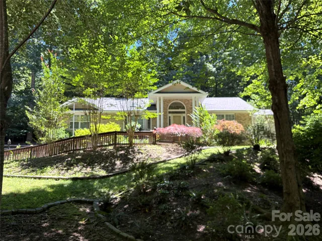 Stately expression sits up in highly sought after Timber Creek Community