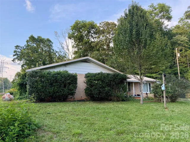 Brick Ranch w/Basement, Carport, and Detached Garage