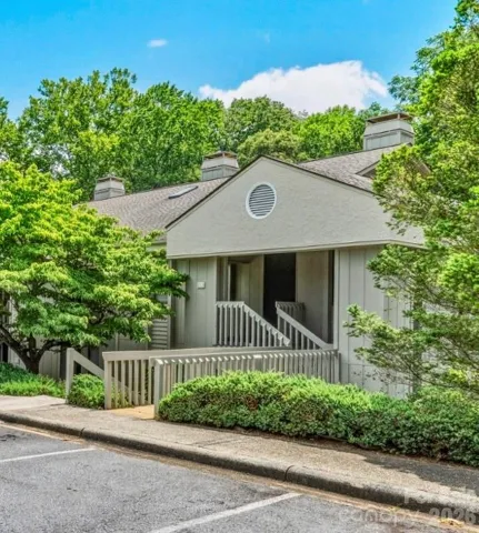 Beautiful end unit nestled on Park like setting just steps to pool and clubhouse!