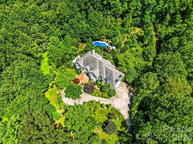 7,507 SF. 10+ private acres. Minutes to Asheville. A world away from everything else.
