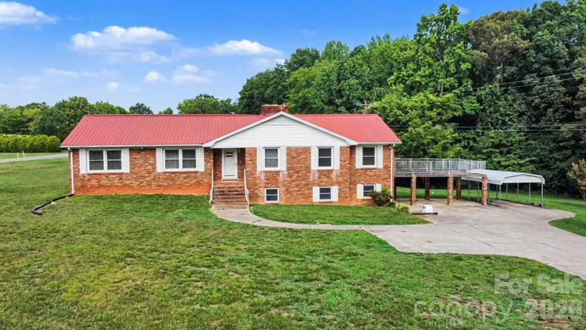 Full brick home located on 3.66 acres in Rowan county with NO city taxes!