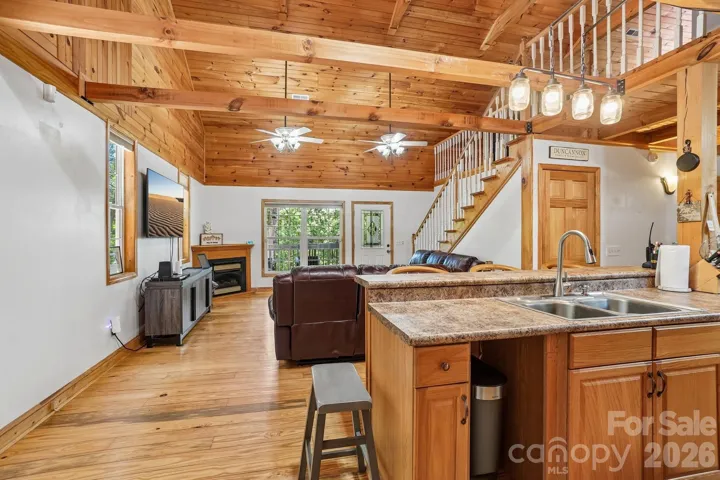Gorgeous open concept wood living!