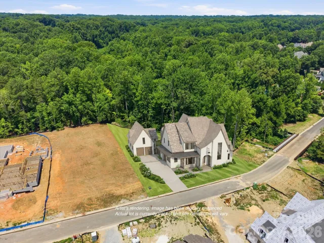 House shown is proposed. Lot is vacant.