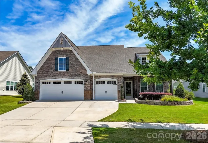 Wonderful Curb Appeal is enhanced by Stone Accents on this Hopewell Plan w/Three Car Garage