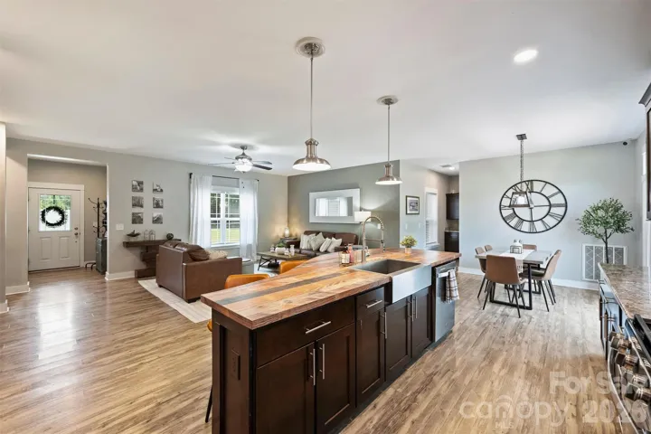 Welcome Home: Large 2.38 acre backyard and extended covered parking area and attached garage, Pergola outdoor living space, deck and patio area
