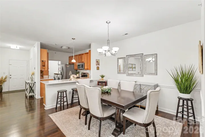 Open floor plan with solid surface flooring throughout