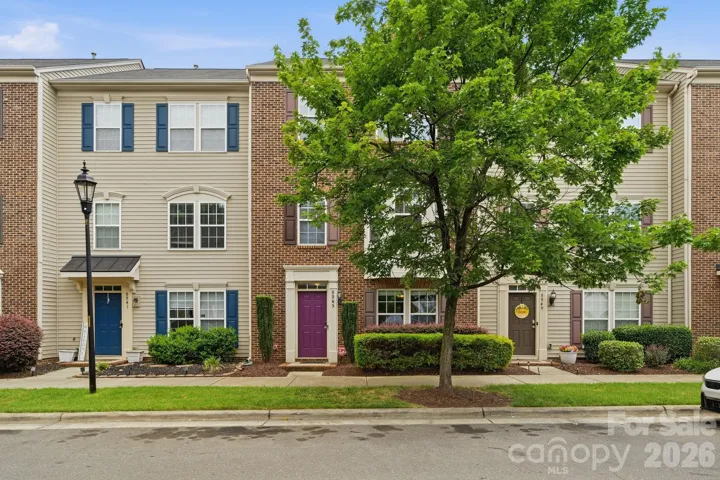 9945 Kings Parade Blvd. Brick front with Bay window.