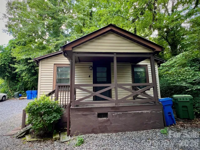 Park in the front or on the side of this cute cottage