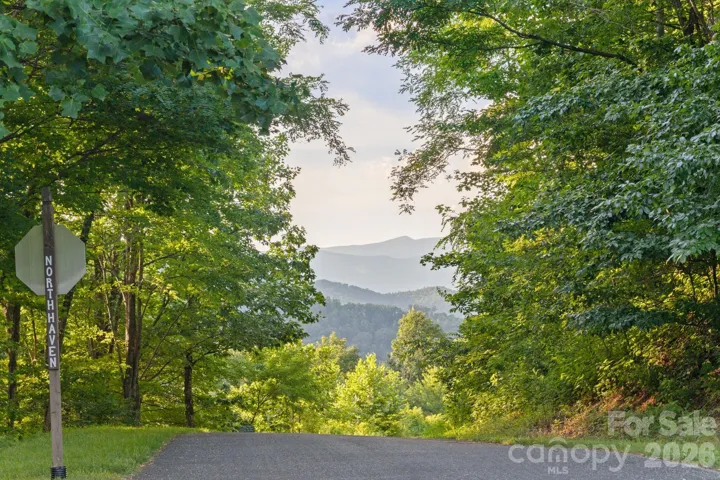 Breathtaking views throughout gated community of Creston, one of Western North Carolina's premier gated conservation communities. All paved roads.