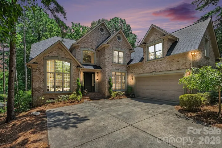 Beautifully refreshed custom built full-brick home showcasing timeless craftsmanship, exceptional architectural detail, and thoughtfully curated updates.