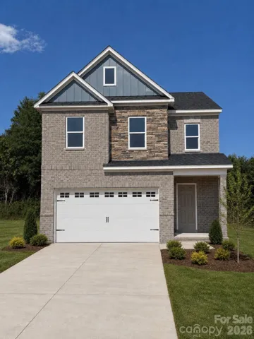 Artist rendering/photo enhancement shown for illustrative purposes only. Home is currently under construction. Exterior colors, landscaping, garage door style, site conditions, and other features may vary from final construction.