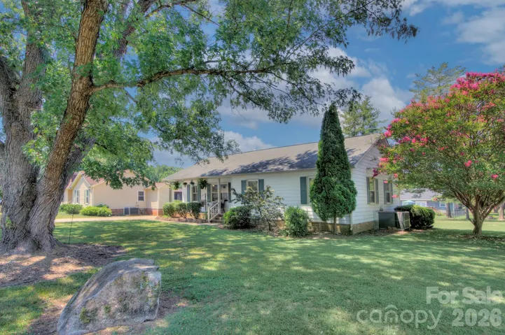 Welcome HOME! This generous homesite offers mature trees, established landscaping and plenty of outdoor space to enjoy. OH, and did we say amazing neighbors?!
