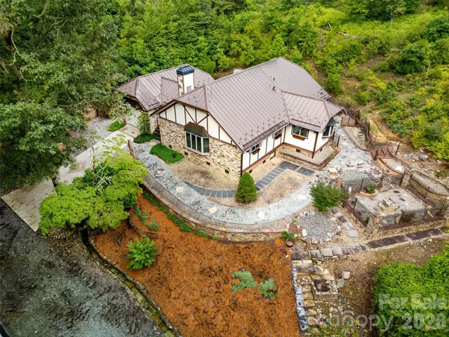 House and Outdoor Setting from the air on the right side. Lady Bugs Rose Garden on far right.!