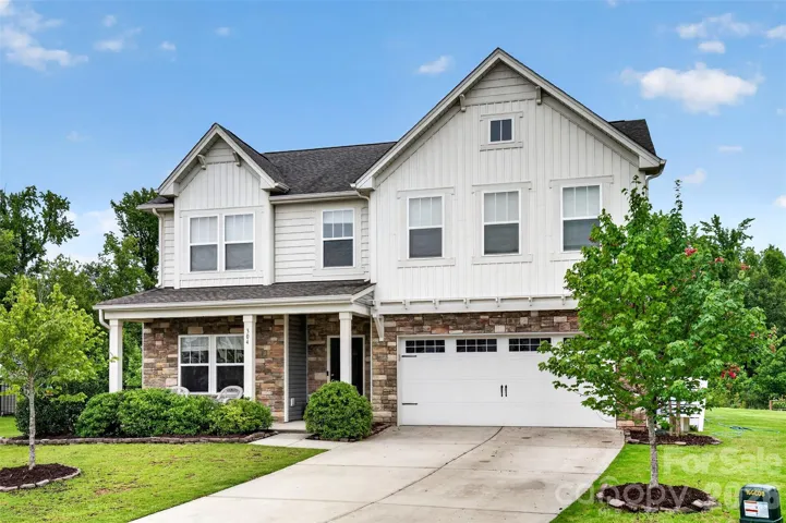 Move-in ready Laine Model from True Homes Great cul-de-sac location with tree-lined backyard.