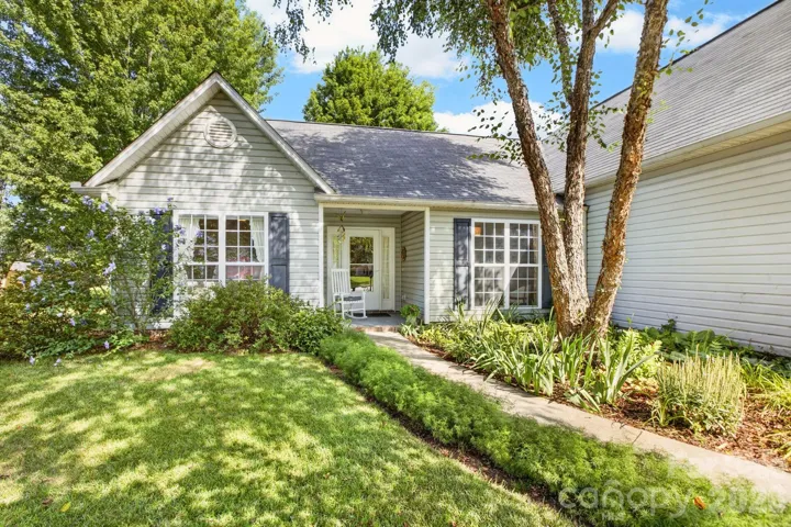 Welcome home! A sweet little front porch to greet the neighbors that come by.