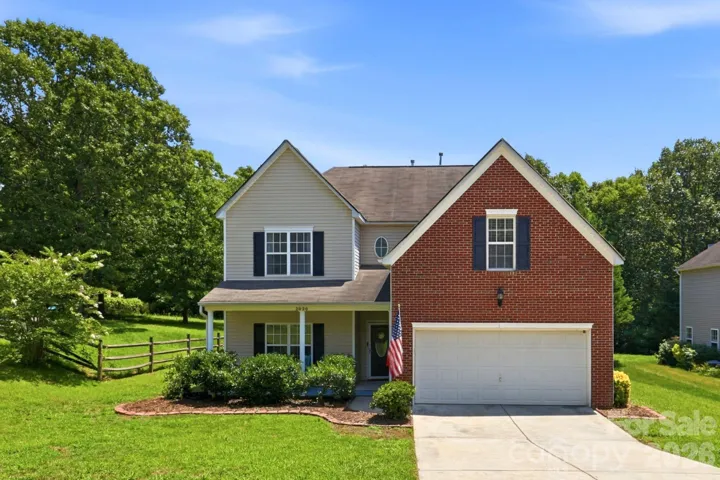 Walkable to downtown Waxhaw customized home welcomes you!