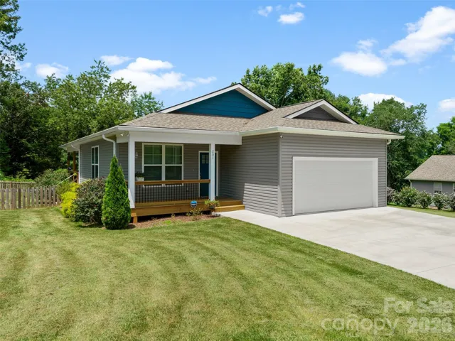 Welcome home to this beautifully maintained single-level home, built in 2022 and conveniently located near East Flat Rock.