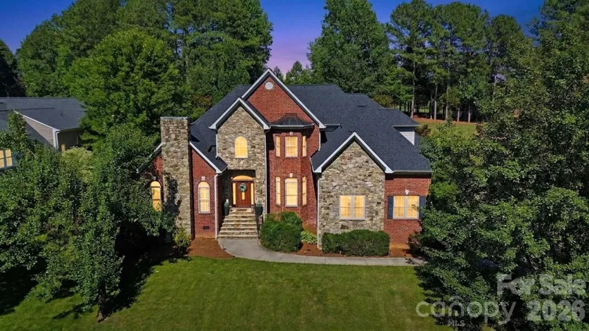 Welcome Home – Timeless brick and stone architecture, beautiful curb appeal, and an impressive presence from the moment you arrive.