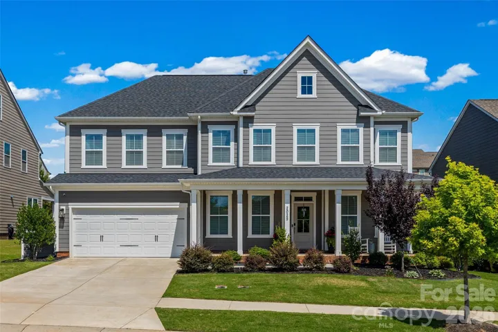 Gorgeous front porch on this traditional home