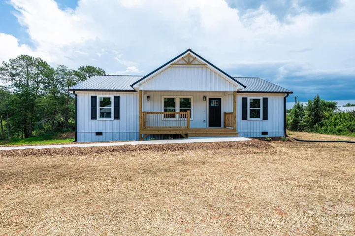 This is a stock photo of a different home but the same ext colors, layout, & square footage.