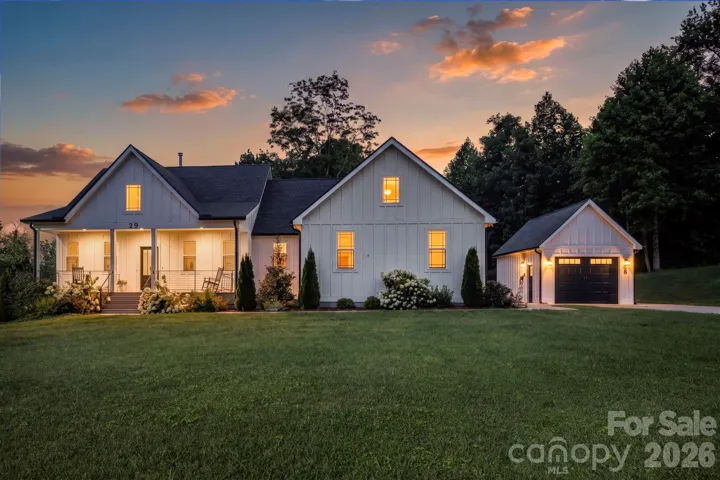 Twilight view of the beautiful ranch farmhouse