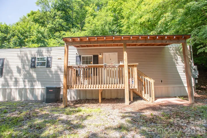 Front with covered deck/porch