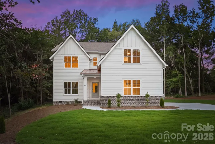 Front exterior view at twilight.