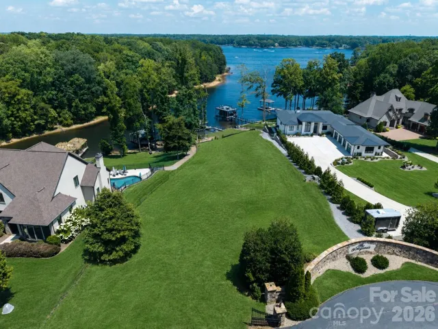 Fabulous Lot in wonderful neighborhood with Existing Dock in place. (Grass edited on photo)