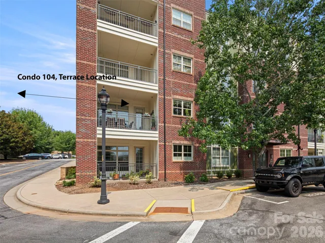Exterior View. Balcony is the one above the ground level balcony. This also pictures the deeded parking space for #104