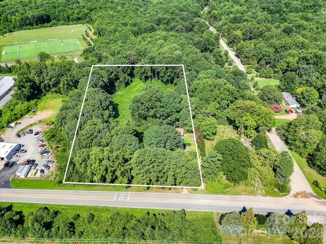 Prime 3.86-acre commercial site with boundary overlay showcasing exceptional road frontage along N NC Business Highway 16 and outstanding redevelopment potential in one of Denver's fastest-growing commercial corridors.