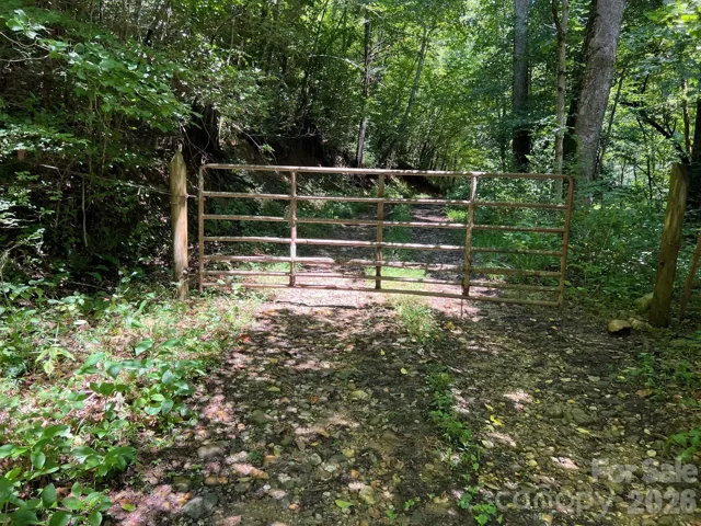 Property at the left of gate, DO NOT BLOCK GATE