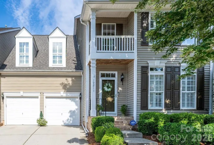 This townhome feels like a single-family home w. greenspace on one side.
