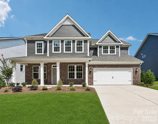 Model Home Photo - For Reference Only (Actual Exterior Color Palette Attached)