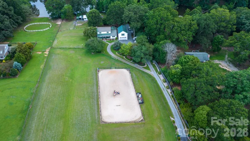 4 interconnected pastures, riding arena, 4 stall barn, pond, and more