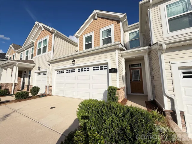 Front Exterior with 2-car Garage and Driveway
