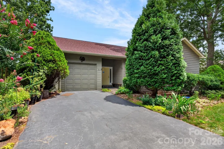 Welcome to 16 Spring Hollow Circle - a detached townhome with 1,614 square feet of main-level living space.