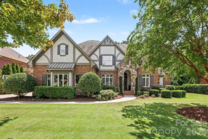 Brick Exterior w/ Stone and Stucco accents & wood shutters
