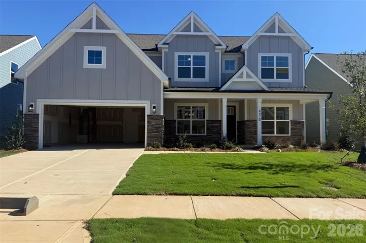 Homesite 111 features a Charleston L floorplan