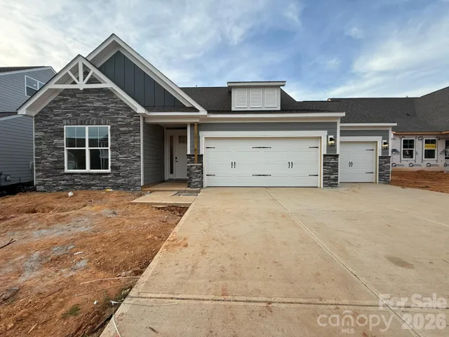 Homesite 102 features a Wescott B with utility garage