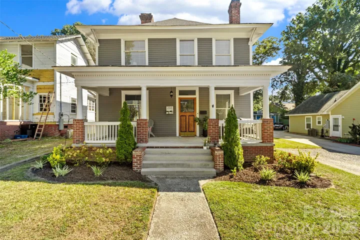 Built in 1920, this grand American Foursquare stands two blocks from downtown Rock Hill