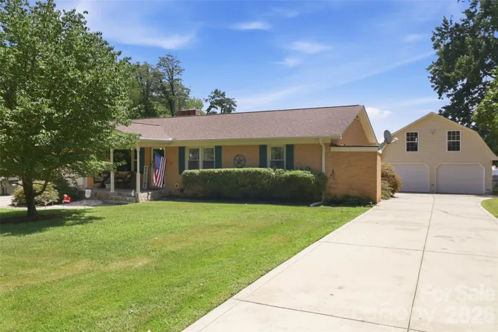 A standout feature of this property is the oversized detached 2-car garage, providing a total of 3 garage spaces when combined with the attached garage. Above the detached garage is a heated and cooled flex space, perfect for a home office, studio, hobby room, gym, or additional recreation space.