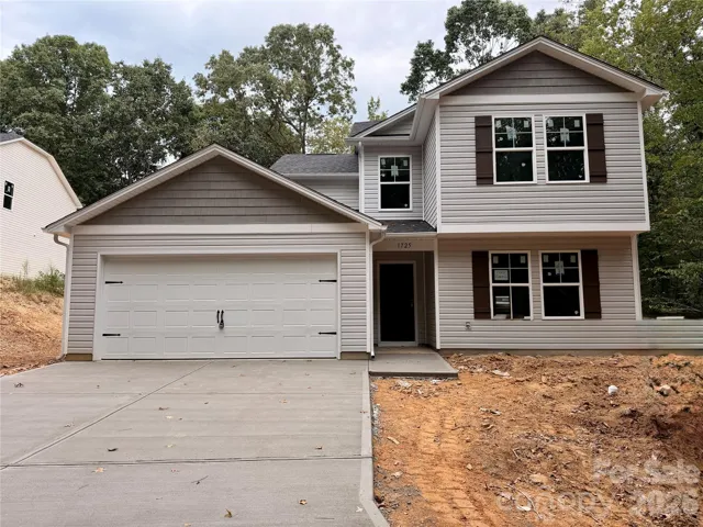 1725 Evans Drive is on over an acre with 5 bedrooms, 3 full bathrooms, ready in Early November