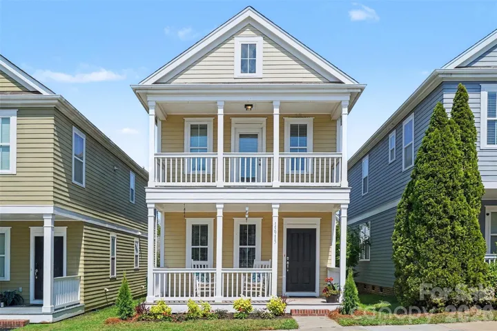 Welcome home to this charming Charleston style home in the Davidson neighborhood of Summers Walk