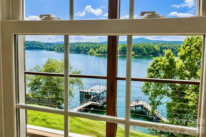 View from the primary suite—step onto your private balcony and unwind while taking in beautiful sunset views.