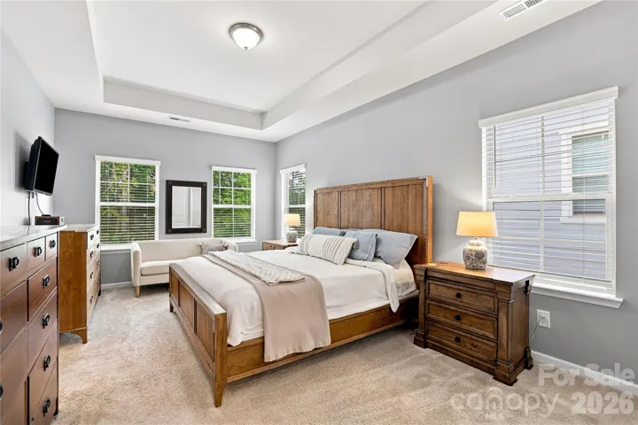 Large primary with trey ceiling and Dual Closets