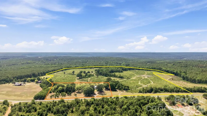 5.4+/- acre homesite outlined in orange can be purchased for an additional price. All property lines are approximate.